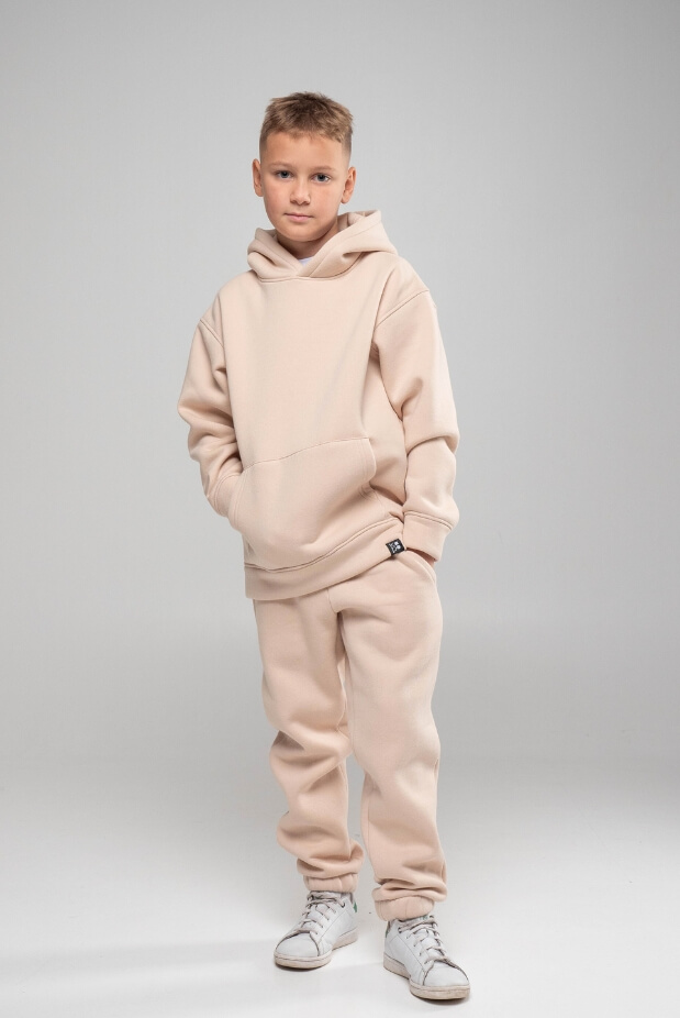 Tracksuit for a boy with a hoodie on fleece. Color: Beige