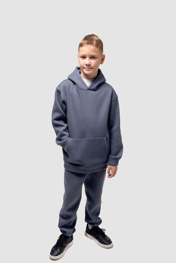 Tracksuit for a boy with a hoodie on fleece. Color: Grey