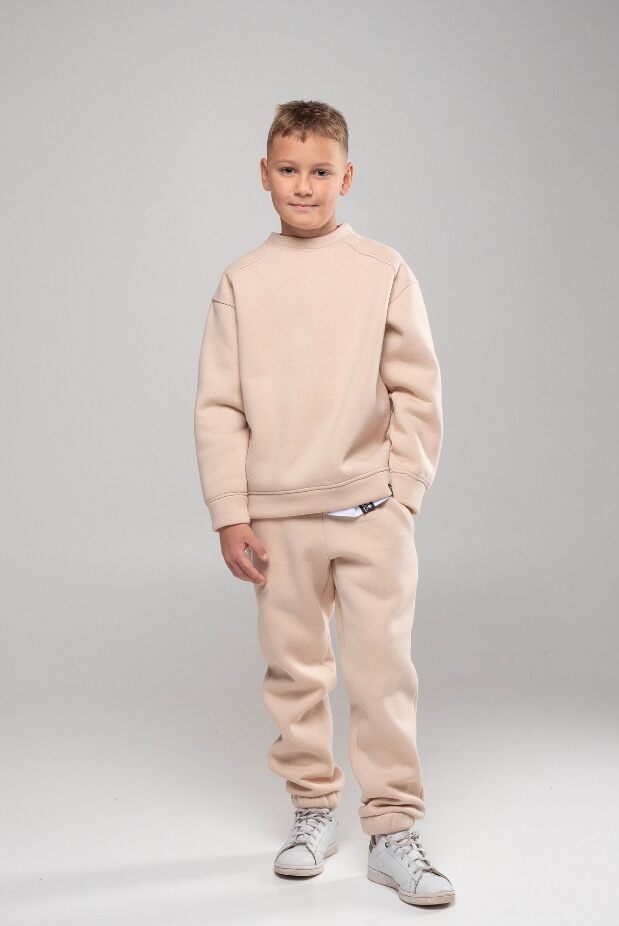 Sports tracksuit for a boy with a fleece sweatshirt. Color: Beige