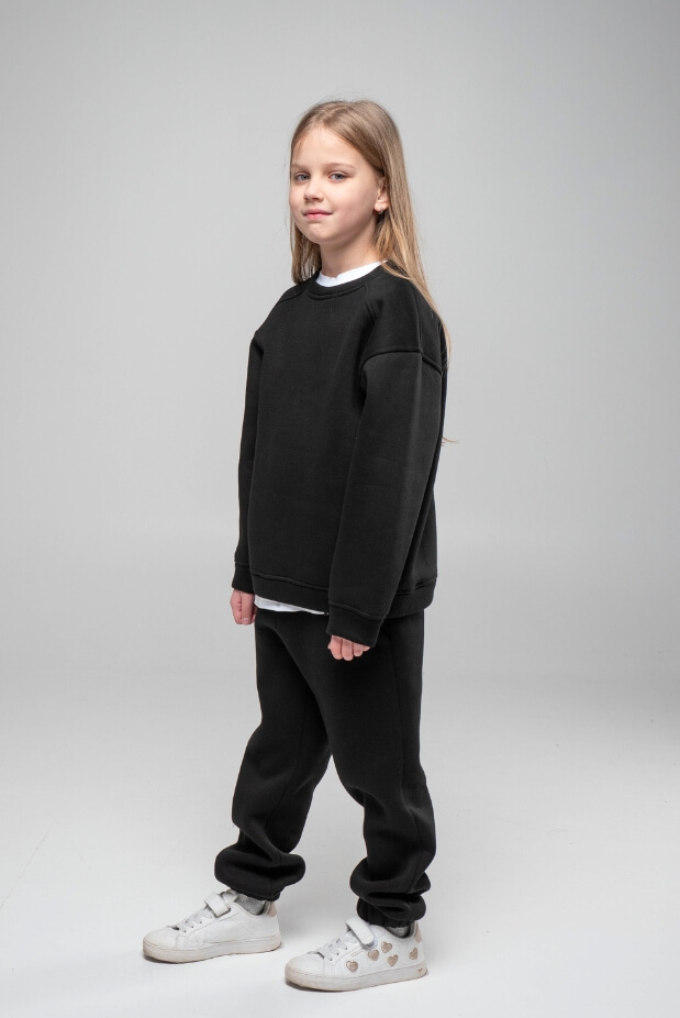 Sports tracksuit for a girl with a fleece sweatshirt. Color: Black