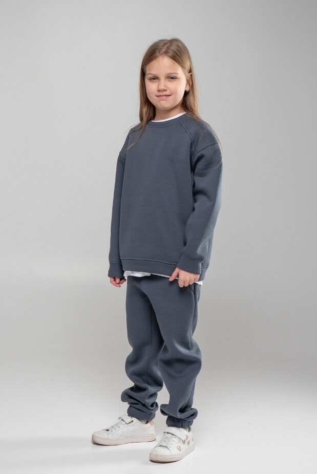 Sports tracksuit for a girl with a fleece sweatshirt. Color: Beige